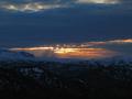 Faszinierende Stimmung mit untergehender Sonne und Wolken