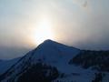 Die Sonne geht ber dem Galsterberg unter
