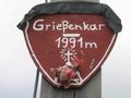 Schild am Gipfelkreuz